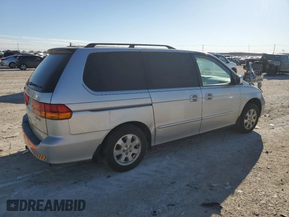2003 Honda Odyssey EX-L with VIN 5FNRL18943B157513, listed as a Copart auction lot 47135305 with 199,079 mi miles and Salvage Title. Bid and sale history available at DreamBid. Image 3.