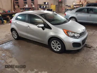 2012 Kia Rio LX with VIN KNADM5A33C6027414, listed as a IAAI auction lot 41935398 with 146,627 mi miles. Bid and sale history available at carsss.com. Image 1.
