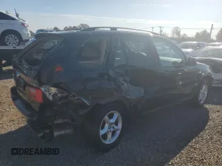 2003 BMW X5 3.0i with VIN 5UXFA53563LV96891, listed as a Copart auction lot 77636084 with 0 mi miles and Salvage Title. Bid and sale history available at carsss.com. Image 3.