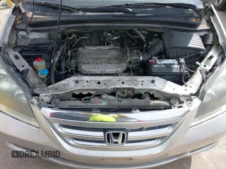 2005 Honda Odyssey EX with VIN 5FNRL38415B039809, listed as a IAAI auction lot 41884459 with 231,258 mi miles. Bid and sale history available at carsss.com. Image 10.