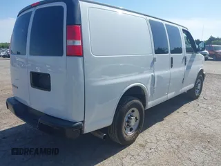 2019 Chevrolet Express Cargo Van with VIN 1GCWGAFP5K1296131, listed as a IAAI auction lot 42082742 with 217,740 mi miles. Bid and sale history available at carsss.com. Image 4.