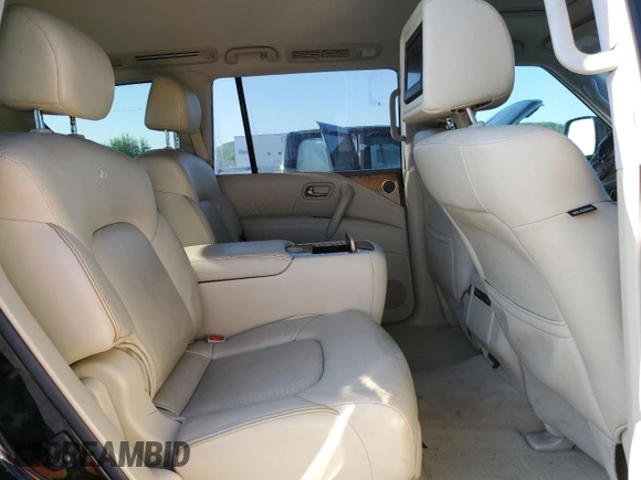 2013 Infiniti QX56 z VIN JN8AZ2NF5D9530196, wystawiony jako Copart lot #53971205 z przebiegiem 188 608 mil mil oraz Czysty tytuł • Clean title. Historia ofert i sprzedaży dostępna na DreamBid. Obrazek 11.