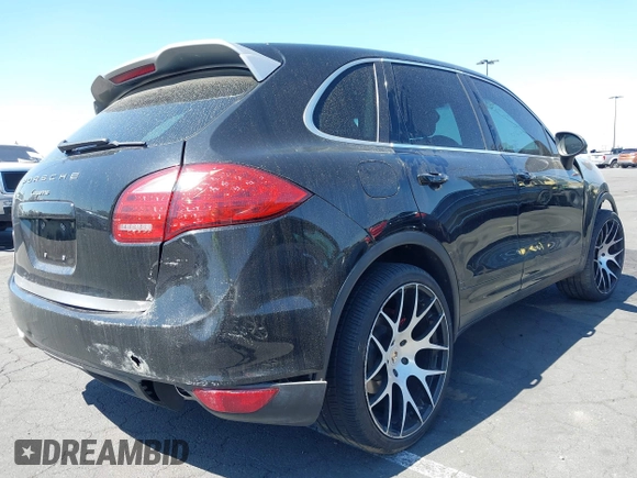 2014 Porsche Cayenne with VIN WP1AA2A23ELA09728, listed as a IAAI auction lot 42289887 with 153,533 mi miles and . Bid and sale history available at DreamBid. Image 4.