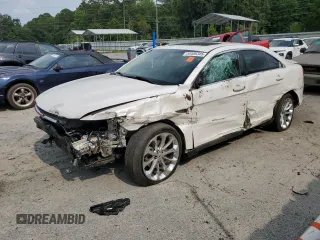 2014 Ford Taurus Limited with VIN 1FAHP2F8XEG116592, listed as a Copart auction lot 59486345 with 134,359 mi miles and Salvage title. Bid and sale history available at DreamBid. Image 1.