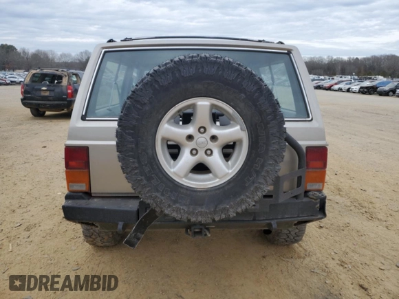 1993 Jeep Cherokee Sport with VIN 1J4FJ67S6PL580133, listed as a Copart auction lot 43230005 with 122,173 mi miles and Salvage Title. Bid and sale history available at carsss.com. Image 6.