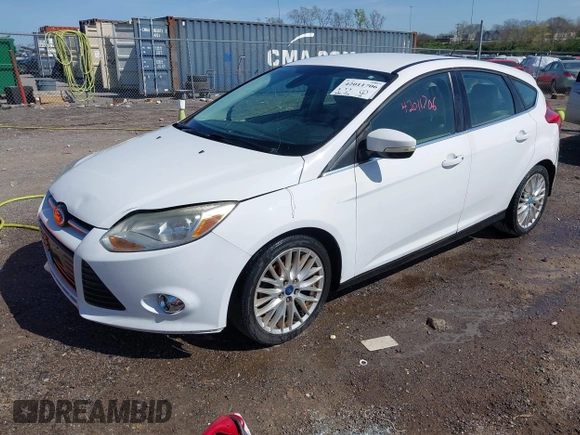 2012 Ford Focus SEL with VIN 1FAHP3M21CL413436, listed as a IAAI auction lot 42011706 with 392,754 mi miles. Bid and sale history available at carsss.com. Image 2.