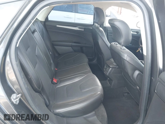 2016 Ford Fusion Titanium with VIN 3FA6P0SU9GR134575, listed as a IAAI auction lot 42338427 with 123,765 mi miles and . Bid and sale history available at DreamBid. Image 8.