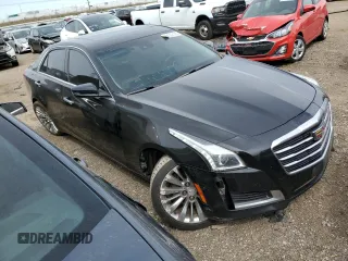 2015 Cadillac CTS Luxury AWD with VIN 1G6AX5SX6F0115950, listed as a Copart auction lot 54502195 with 118,256 mi miles and Salvage title. Bid and sale history available at DreamBid. Image 4.