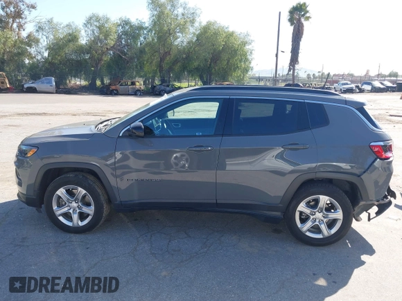 2023 Jeep Compass Latitude with VIN 3C4NJDBN5PT540444, listed as a IAAI auction lot 41820993 with 47,516 mi miles and . Bid and sale history available at DreamBid. Image 14.