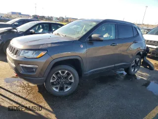 2018 Jeep Compass Trailhawk with VIN 3C4NJDDB4JT192663, listed as a Copart auction lot 79202704 with 73,665 mi miles and Salvage title. Bid and sale history available at DreamBid. Image 1.