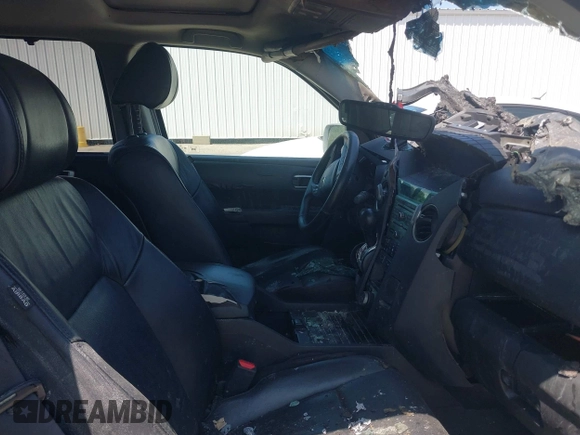 2010 Honda Pilot Touring z VIN 5FNYF4H94AB010058, wystawiony jako IAAI lot #42495313 z przebiegiem 157 306 mil mil oraz . Historia ofert i sprzedaży dostępna na DreamBid. Obrazek 5.