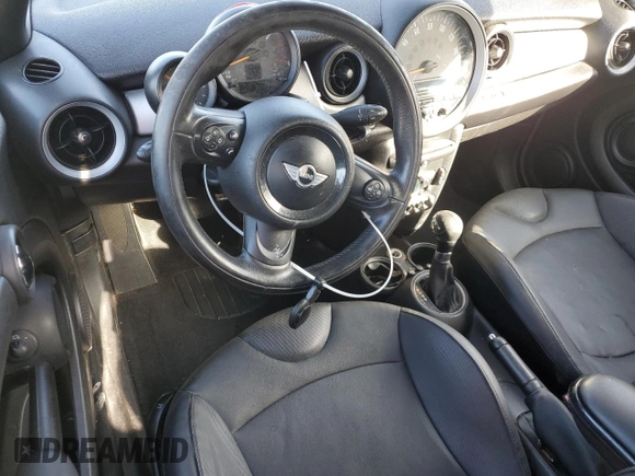2015 MINI Convertible with VIN WMWZN3C50FT861992, listed as a Copart auction lot 84189754 with Not provided miles and Salvage title. Bid and sale history available at DreamBid. Image 8.
