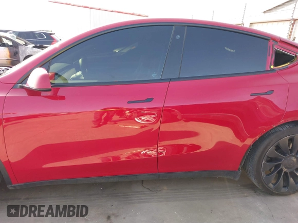 2022 Tesla Model Y Performance z VIN 7SAYGDEF0NF518740, wystawiony jako IAAI lot #41785358 z przebiegiem 50 692 mil mil oraz . Historia ofert i sprzedaży dostępna na DreamBid. Obrazek 15.