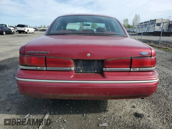 1995 Ford Crown Victoria LX с VIN 2FALP74W2SX117864, выставлен на аукционе Copart как лот 52440825 с пробегом 109 409 миль миль и Списание • Salvage title. История ставок и продаж доступна на DreamBid. Изображение 6.