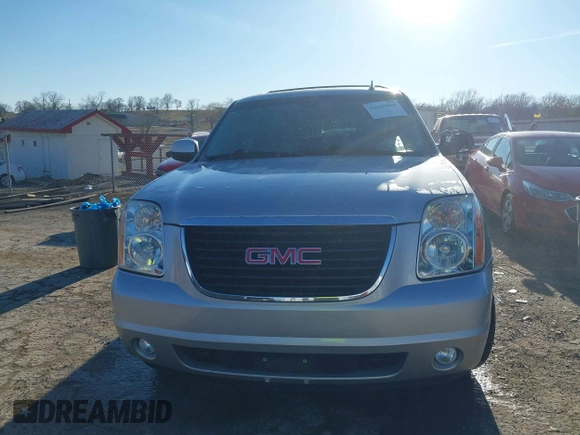 2013 GMC Yukon SLT with VIN 1GKS1CE04DR180881, listed as a IAAI auction lot 41647032 with 187,228 mi miles. Bid and sale history available at carsss.com. Image 12.