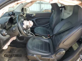 2016 Smart fortwo Passion с VIN WMEFJ5DA7GK066701, выставлен на аукционе Copart как лот 59093055 с пробегом 84 417 миль миль и Списание • Salvage title. История ставок и продаж доступна на DreamBid. Изображение 7.