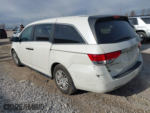 2014 Honda Odyssey LX with VIN 5FNRL5H24EB001551, listed as a IAAI auction lot 41879040 with 119,200 mi miles and . Bid and sale history available at DreamBid. Image 3.