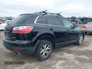 2011 Mazda CX-9 Touring with VIN JM3TB2CA3B0319068, listed as a IAAI auction lot 41731470 with 111,273 mi miles and . Bid and sale history available at DreamBid. Image 4.