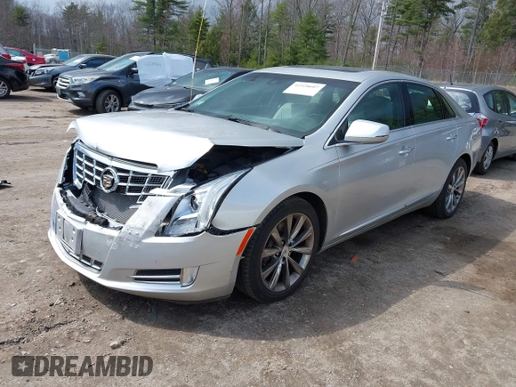 2013 Cadillac XTS Luxury z VIN 2G61P5S33D9170453, wystawiony jako IAAI lot #41928607 z przebiegiem 68 094 mil mil oraz . Historia ofert i sprzedaży dostępna na DreamBid. Obrazek 2.
