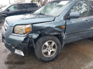 2007 Honda Pilot EX with VIN 2HKYF18437H528868, listed as a IAAI auction lot 41762030 with 203,212 mi miles. Bid and sale history available at carsss.com. Image 6.