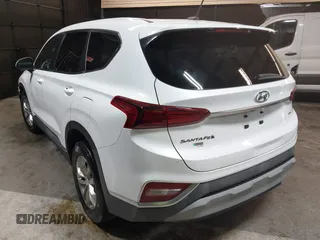 2020 Hyundai Santa Fe SE with VIN 5NMS2CAD8LH163523, listed as a IAAI auction lot 42123756 with 72,992 mi miles and . Bid and sale history available at DreamBid. Image 3.