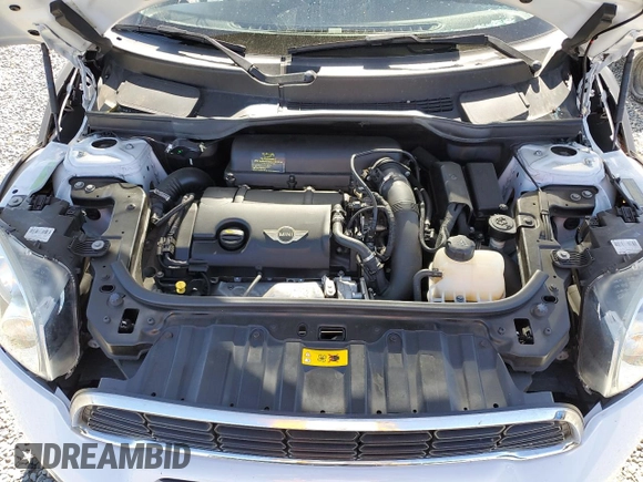 2013 MINI Countryman S ALL4 z VIN WMWZC5C56DWM16296, wystawiony jako Copart lot #56985615 z przebiegiem 63 858 mil mil oraz Szkoda całkowita • Salvage title. Historia ofert i sprzedaży dostępna na DreamBid. Obrazek 12.