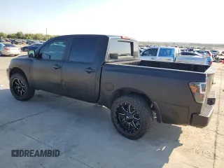 2015 Nissan Titan SL with VIN 1N6AA0ED7FN510609, listed as a Copart auction lot 74371254 with 115,916 mi miles and Salvage Title. Bid and sale history available at carsss.com. Image 2.