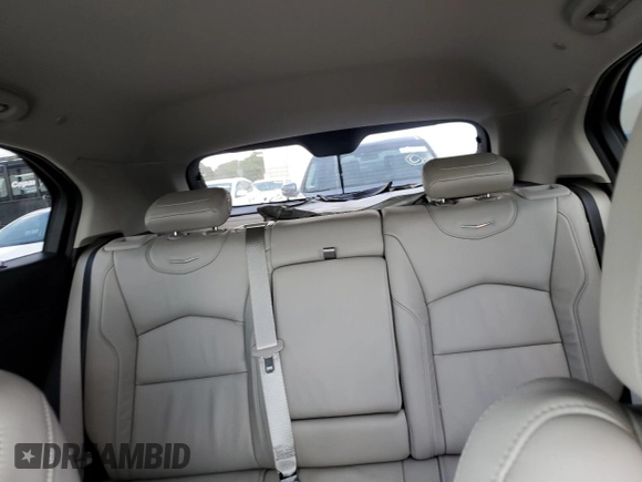 2020 Cadillac XT4 FWD Premium Luxury z VIN 1GYFZCR49LF118146, wystawiony jako Copart lot #44537995 z przebiegiem Nie podano mil oraz Nie do naprawy. Historia ofert i sprzedaży dostępna na DreamBid. Obrazek 10.
