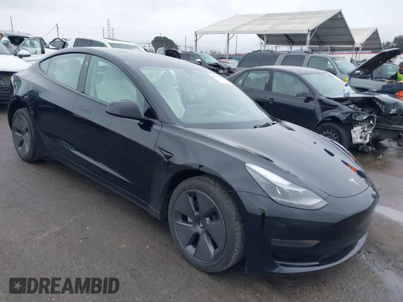 2023 Tesla Model 3 with VIN 5YJ3E1EA0PF587656, listed as a IAAI auction lot 41489586 with 12,844 mi miles and . Bid and sale history available at DreamBid. Image 1.