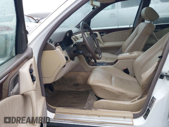 1997 Mercedes-Benz E-Class with VIN WDBJF55F4VA424262, listed as a IAAI auction lot 41462993 with 1 mi miles. Bid and sale history available at carsss.com. Image 5.