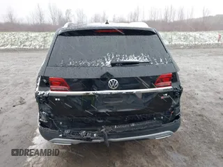 2018 Volkswagen Atlas SE z VIN 1V2LR2CA1JC515168, wystawiony jako IAAI lot #42024499 z przebiegiem 112 558 mil mil oraz . Historia ofert i sprzedaży dostępna na DreamBid. Obrazek 6.