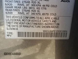 2013 Audi Q7 3.0T Premium Plus with VIN WA1LGAFE1DD010904, listed as a Copart auction lot 49454435 with 104,697 mi miles and Salvage Title. Bid and sale history available at carsss.com. Image 13.