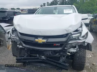 2020 Chevrolet Colorado 4WD Z71 with VIN 1GCGTDEN8L1238033, listed as a IAAI auction lot 42279524 with 22,164 mi miles and . Bid and sale history available at DreamBid. Image 6.