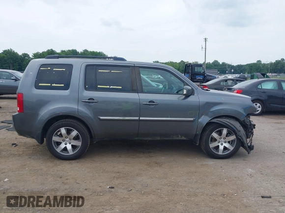 2013 Honda Pilot Touring with VIN 5FNYF3H9XDB024500, listed as a IAAI auction lot 42683695 with 151,441 mi miles and . Bid and sale history available at DreamBid. Image 14.