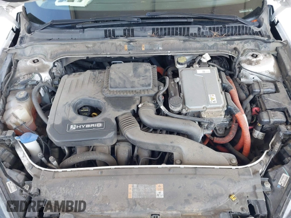 2013 Ford Fusion SE Hybrid z VIN 3FA6P0LU1DR310075, wystawiony jako IAAI lot #42085556 z przebiegiem Nie podano mil oraz . Historia ofert i sprzedaży dostępna na DreamBid. Obrazek 10.