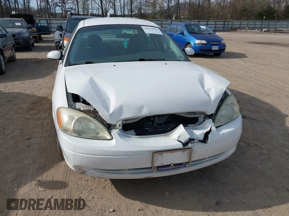 2003 Ford Taurus SE Standard with VIN 1FAFP53U73A107231, listed as a IAAI auction lot 41826418 with 123,774 mi miles. Bid and sale history available at carsss.com. Image 6.