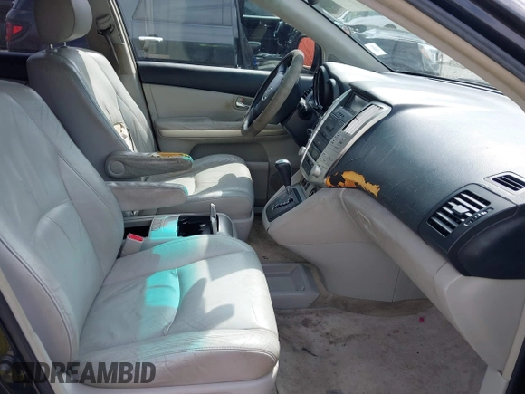 2006 Lexus RX 400h with VIN JTJGW31U560001666, listed as a IAAI auction lot 42257070 with 267,244 mi miles and . Bid and sale history available at DreamBid. Image 5.