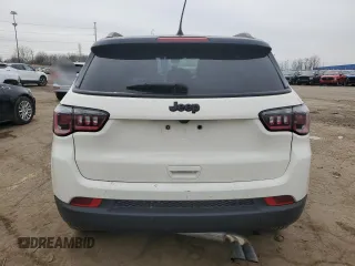 2019 Jeep Compass Altitude with VIN 3C4NJCBB4KT618673, listed as a Copart auction lot 51801955 with 104,784 mi miles and Salvage title. Bid and sale history available at DreamBid. Image 6.