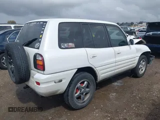 1999 Toyota RAV4 with VIN JT3GP10V7X7057281, listed as a IAAI auction lot 42110228 with 301,749 mi miles and . Bid and sale history available at DreamBid. Image 4.