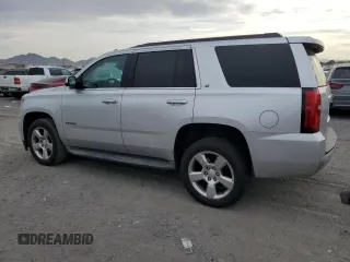 2015 Chevrolet Tahoe LT with VIN 1GNSCBKC2FR166597, listed as a Copart auction lot 50976505 with 155,069 mi miles and Salvage Title. Bid and sale history available at DreamBid. Image 2.