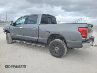 2016 Nissan Titan S with VIN 1N6BA1F14GN517646, listed as a Copart auction lot 55381575 with 147,654 mi miles and Salvage title. Bid and sale history available at DreamBid. Image 2.