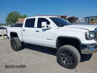 2017 GMC Sierra 1500 SLT z VIN 3GTU2NEC2HG474079, wystawiony jako IAAI lot #41899673 z przebiegiem 104 033 mil mil oraz . Historia ofert i sprzedaży dostępna na DreamBid. Obrazek 13.