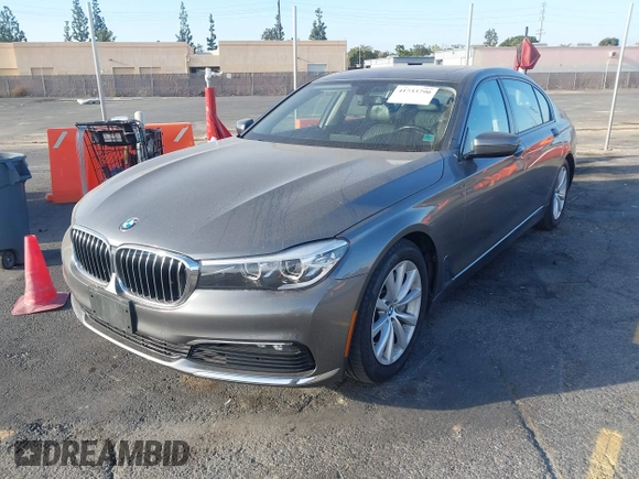 2018 BMW 7 Series 740i with VIN WBA7E2C55JB214987, listed as a IAAI auction lot 41733790 with 96,738 mi miles. Bid and sale history available at carsss.com. Image 2.