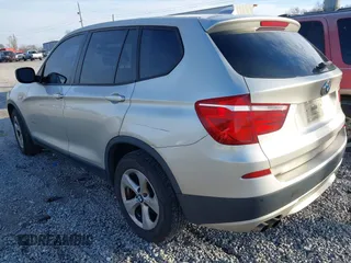 2011 BMW X3 28i with VIN 5UXWX5C50BL703124, listed as a IAAI auction lot 41563175 with 216,317 mi miles. Bid and sale history available at carsss.com. Image 3.