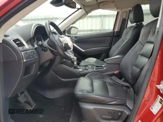 2016 Mazda CX-5 Grand Touring with VIN JM3KE4DY0G0664379, listed as a Copart auction lot 54659005 with 116,022 mi miles and Salvage Title. Bid and sale history available at DreamBid. Image 7.