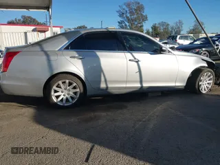 2015 Cadillac CTS AWD z VIN 1G6AW5SX2F0104981, wystawiony jako IAAI lot #41276740 z przebiegiem 87 128 mil mil oraz . Historia ofert i sprzedaży dostępna na DreamBid. Obrazek 13.