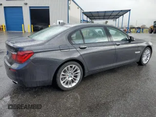 2015 BMW 7 Series 740Li with VIN WBAYE4C52FD947509, listed as a Copart auction lot 49269705 with 80,111 mi miles and Salvage Title. Bid and sale history available at carsss.com. Image 3.