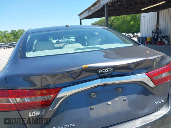 2016 Toyota Avalon Limited with VIN 4T1BK1EB4GU208979, listed as a IAAI auction lot 42032374 with 242,738 mi miles and . Bid and sale history available at carsss.com. Image 6.
