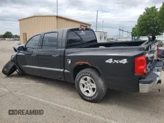 2006 Dodge Dakota SLT z VIN 1D7HW48N56S641575, wystawiony jako Copart lot #60141125 z przebiegiem 135 482 mil mil oraz Szkoda całkowita • Salvage title. Historia ofert i sprzedaży dostępna na DreamBid. Obrazek 2.