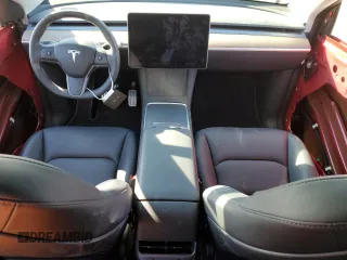 2023 Tesla Model Y Performance with VIN 7SAYGDEFXPF790747, listed as a Copart auction lot 42233855 with 25,452 mi miles and Salvage Title. Bid and sale history available at DreamBid. Image 8.